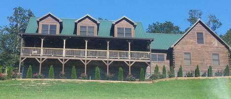 Exterior. Home is located on a steep hillside.