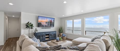 Living room that looks right onto the ocean