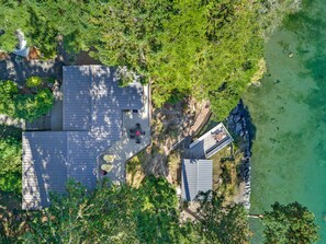 Overhead view of the home and outdoor seating areas