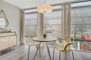 Bright dining room with views of the bay