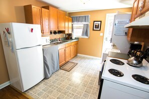 Kitchen with everything you need to cook a meal. 