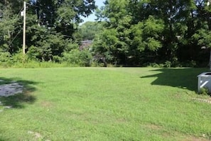 Nice large backyard to grill (charcoal grill is included) and a picnic table.