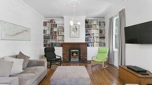 Living area, Cable TV/ Netflix and wine library