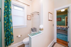The bathroom gets flooded with morning sunlight.