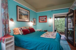open the door to the breeze or listen to the gentle rainfall from the cozy Queen bed