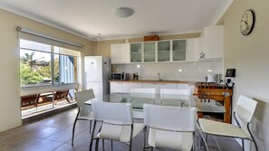 Covered Outdoor Area, Kitchen, Microwave Oven, Refrigerator