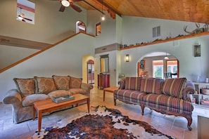 Vaulted ceilings and natural light invite you to relax.