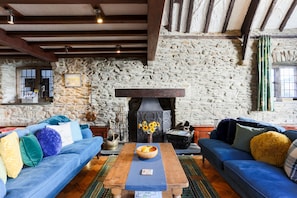 Big comfy sofas to curl up on in front of the roaring log fire