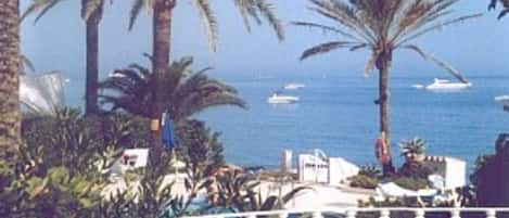 View of pool and sea from lounge