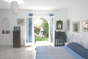 Large master en suite bedroom with private terrace