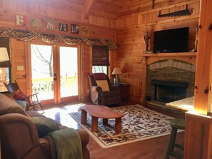 Living Room with Gad Fireplace, Flat Screen with Fire Stick Streaming