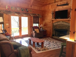 Living Room with Gad Fireplace, Flat Screen with Fire Stick Streaming