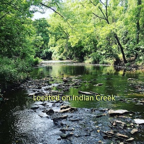 Located on beautiful Indian Creek in the backyard - with miles of trails.