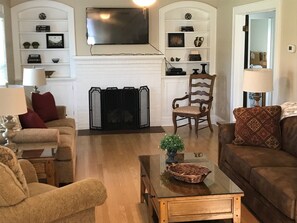 Living Room w/ cable and high speed internet, gas log fireplace.