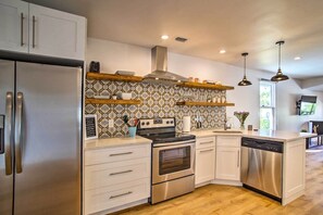 Kitchen | Stainless Steel Appliances | High Chair | Single-Story Home