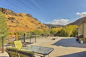 Enjoy mountain views from the furnished upper patio.