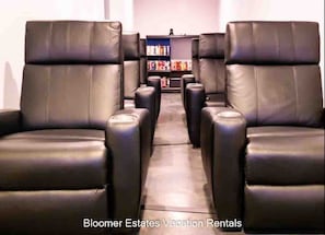 Theater Room - room enought for 6 to each have their own comfortable leather recliner with cup holders