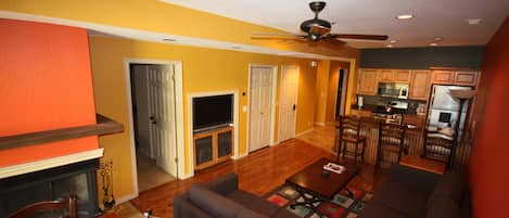 The living room is inviting, open, and has everything you need!