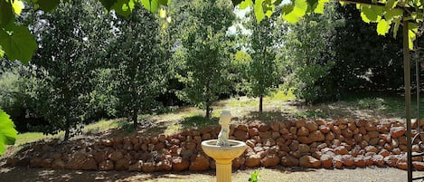 Pavilion bird-filled and private garden