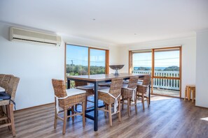 Upstairs dining, split system air con, bar stools