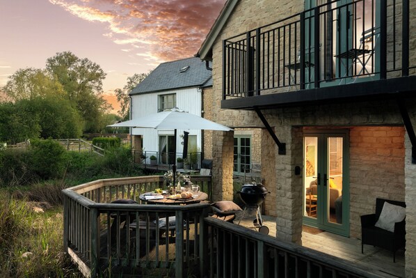 Al fresco sunset supper on secluded south-facing sundeck of Cornerstone Cottage