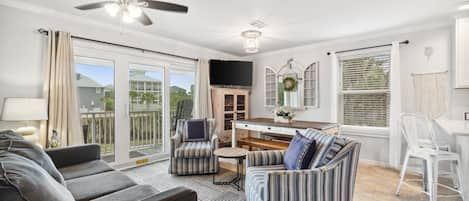 Living room/ dining room combo. New sliding door and new windows 2023!