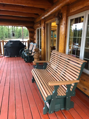 Front porch - propane gas grill and new gliding patio furniture. 