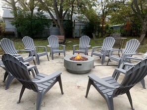 Propane fire pit with seating for ten