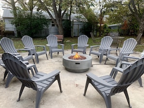 Propane fire pit with seating for ten