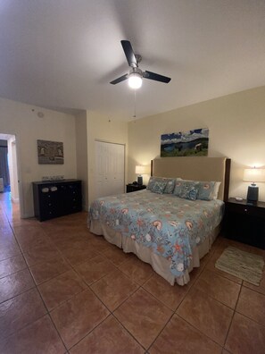 Primary bedroom with king sized bed