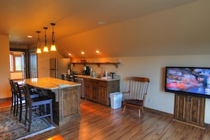 Great room with wood floors & granite counters 