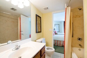 Get ready for your day in this lovely bathroom.