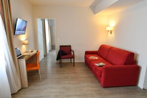 Sink into the cozy sofa after a day exploring the area.