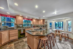 With a beautiful gas range and modern appliances this kitchen is fit for a chef