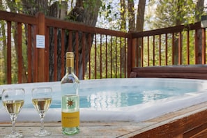 Teton Serenity - two 8-person shared community hot tubs behind the community fitness center building