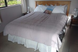 Separate bedroom with queen bed