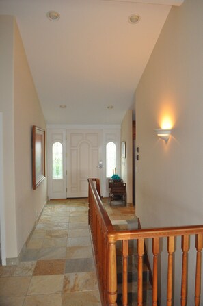 Front door with split level stairway. For easy access to upper and lower floors