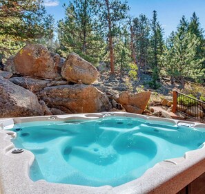 Private hot tub nestled in the rocks