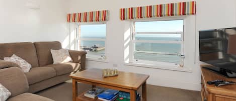 Sit on the sofa and enjoy unparalleled beach view