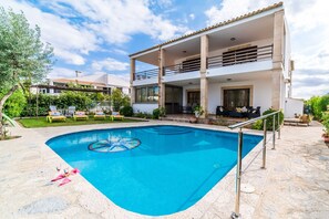 House with barbecue and pool next to muro beach