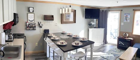 Welcome to Mountain Lodge 125, featuring a kitchen island that accommodates eight people.