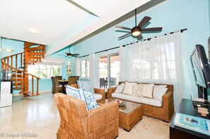 Living room with access to main floor balcony