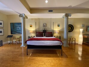 A large and comfortable king sized bed in a well appointed contemporary space.