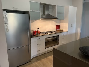 Large fridge to hold all your food and wine & pantry stocked with the essentials