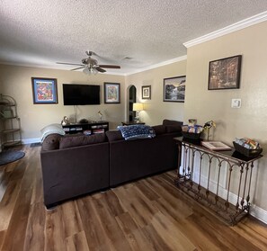 Living Room welcome table with People, Dog Snacks & House Book.