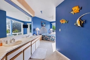 Master bedroom suite with a unique tropical feel