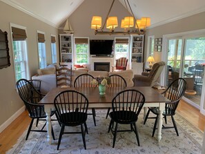 Large dining and family room.  Screened porch access on right