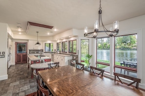 Open living, dining, kitchen all overlooking Mirror Pond, Drake Park, Old Bend