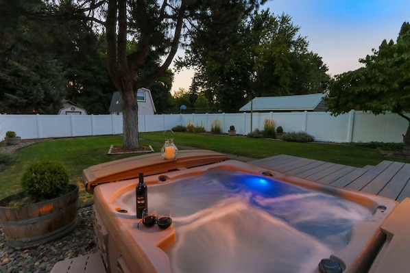Spa located in the spacious fenced back yard.