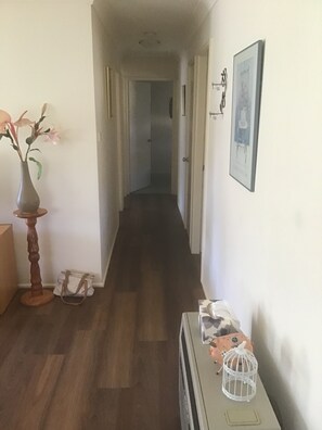 Hallway to bedrooms and bathroom